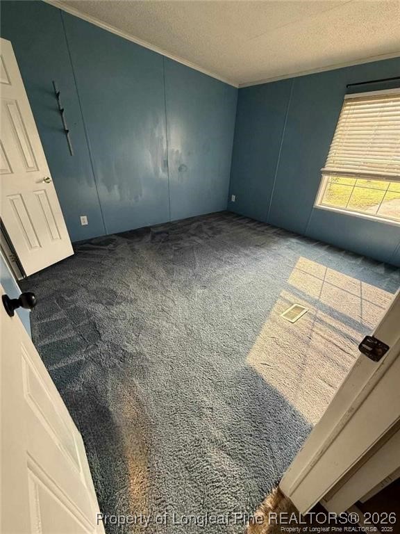 21040 McLaughlin Road Laurinburg, NC 28352 - Photo 5 of 14 a view of an empty room and window