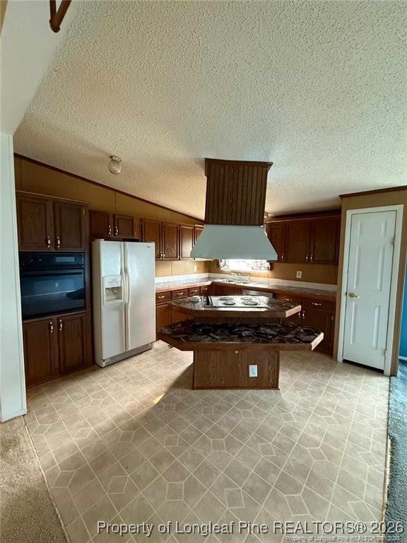 21040 McLaughlin Road Laurinburg, NC 28352 - Photo 9 of 14 a view of kitchen with refrigerator stove and a sink