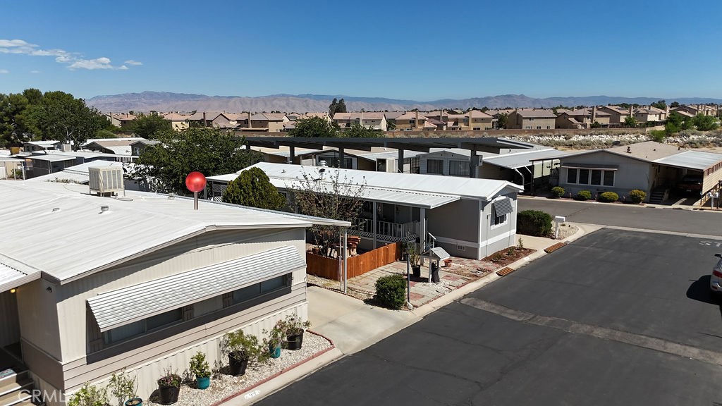 13393 Mariposa Road, Unit 99 Victorville, CA 92395 - Photo 3 of 50 a view of a terrace with sitting area