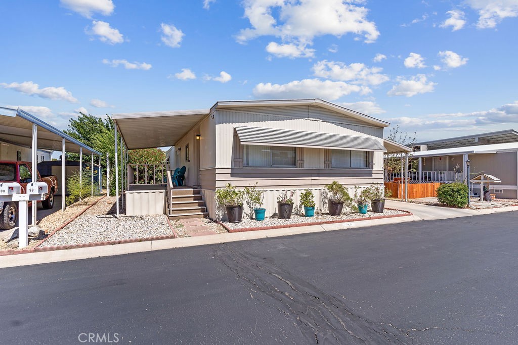 13393 Mariposa Road, Unit 99 Victorville, CA 92395 - Photo 48 of 50 a outdoor view of a building with basket ball court