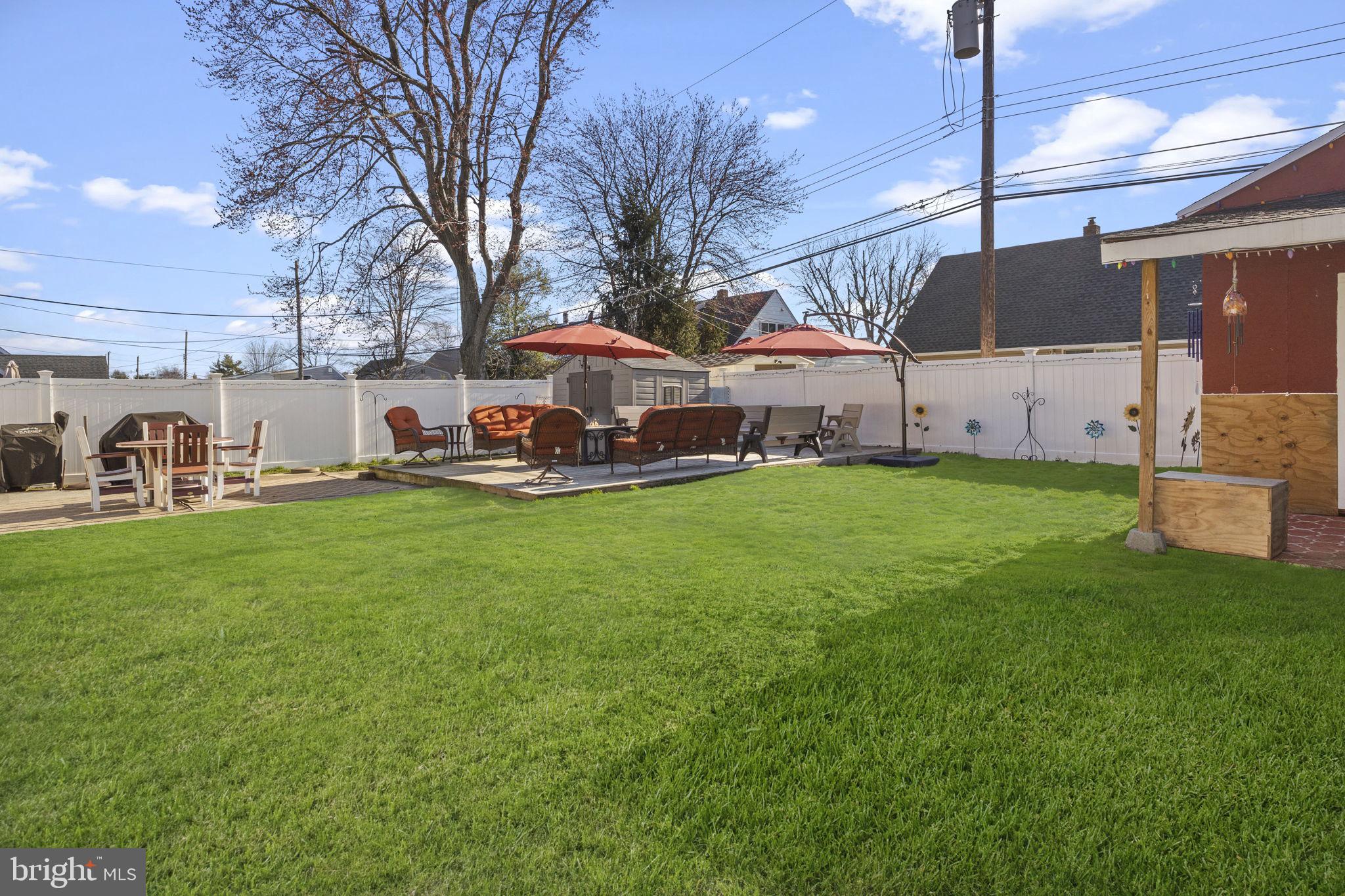 23 Grapevine Road Levittown, PA 19057 - Photo 21 of 25 Fenced, level backyard
