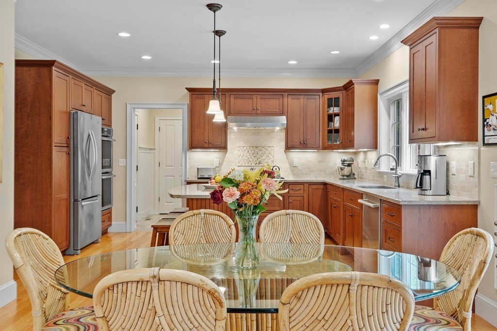 10 Parker Road Bedford, MA 01730 - Photo 16 of 38 a view of a dining room with furniture