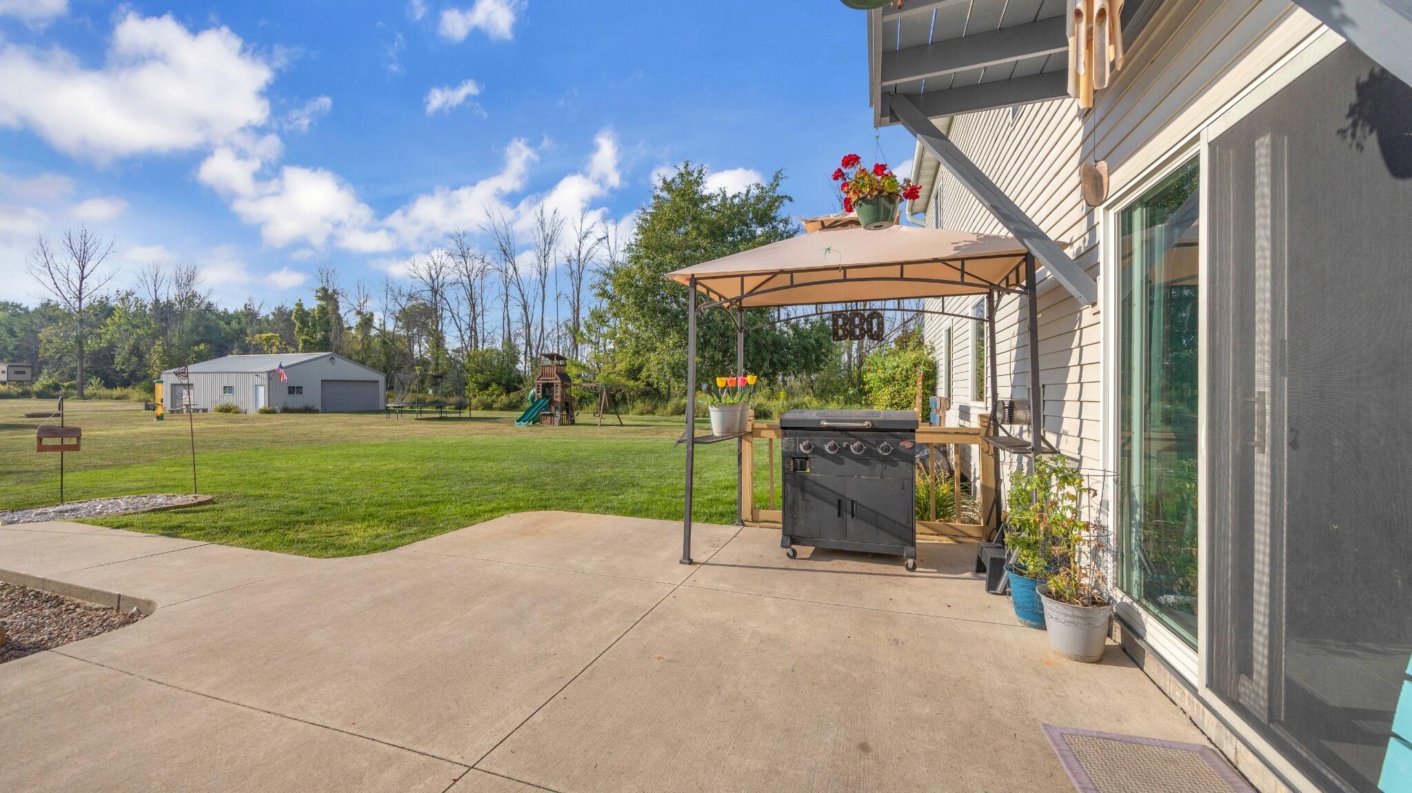514 North Alverno Road Manitowoc Rapids, WI 54220 - Photo 28 of 44 Back Patio
