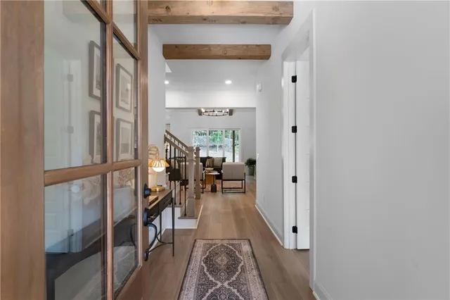 a view of livingroom with furniture and staircase