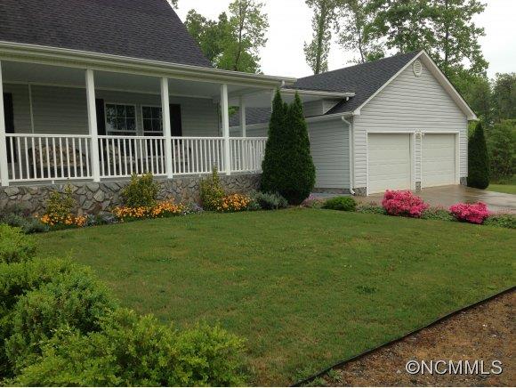1585 Gilmer Edwards Road Rutherfordton, NC 28139 - Photo 2 of 23 a front view of a house with garden