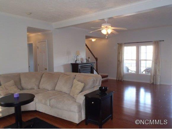 1585 Gilmer Edwards Road Rutherfordton, NC 28139 - Photo 12 of 23 a living room with furniture a lamp and a chandelier