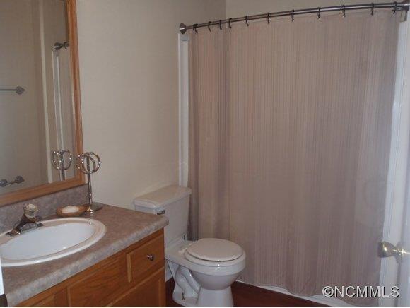 1585 Gilmer Edwards Road Rutherfordton, NC 28139 - Photo 19 of 23 a bathroom with a sink and a mirror