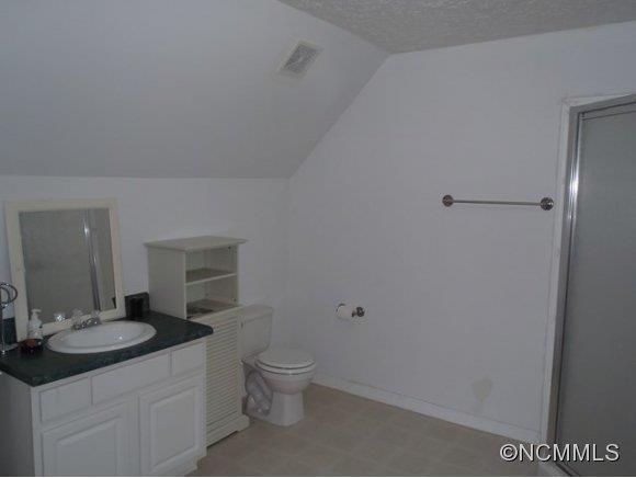 1585 Gilmer Edwards Road Rutherfordton, NC 28139 - Photo 22 of 23 a bathroom with a sink toilet and vanity