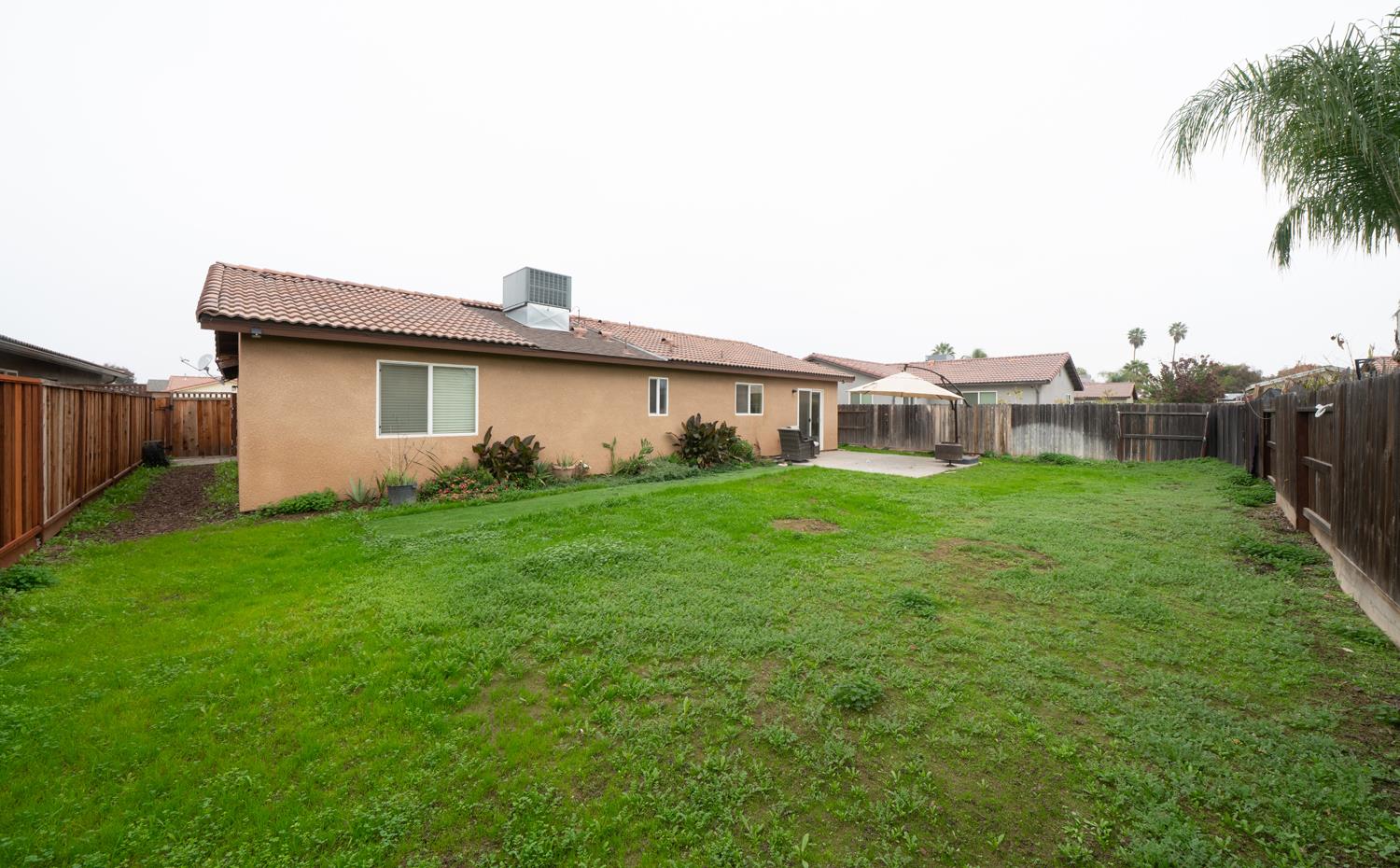 1935 Madison Drive Madera, CA 93638 - Photo 21 of 22 a front view of house with garden