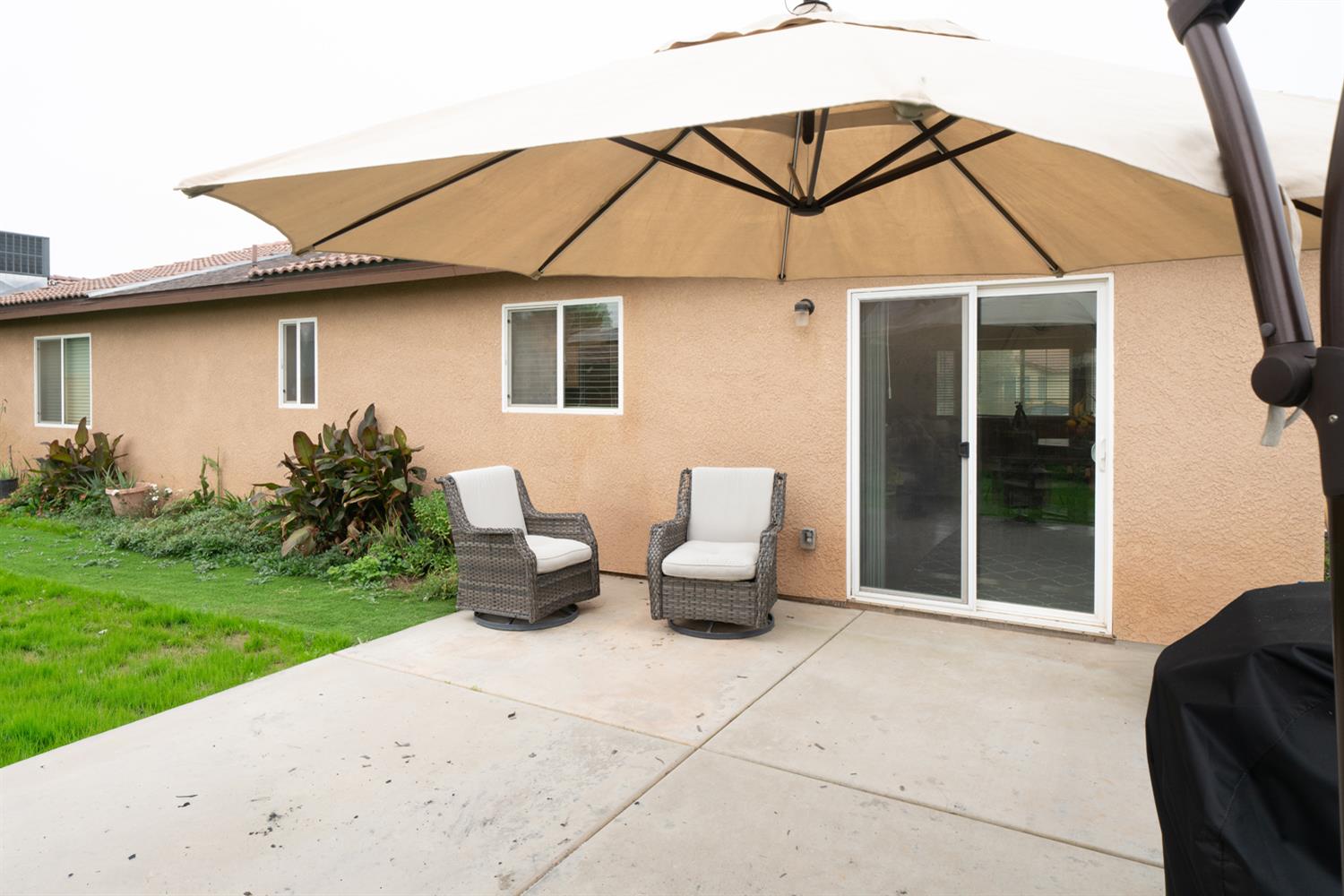 1935 Madison Drive Madera, CA 93638 - Photo 22 of 22 a front view of a house with garden