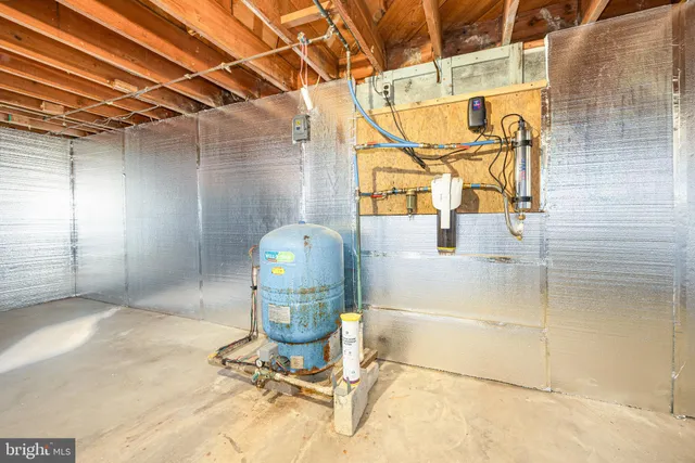 a front view of a house with a garden and pathway