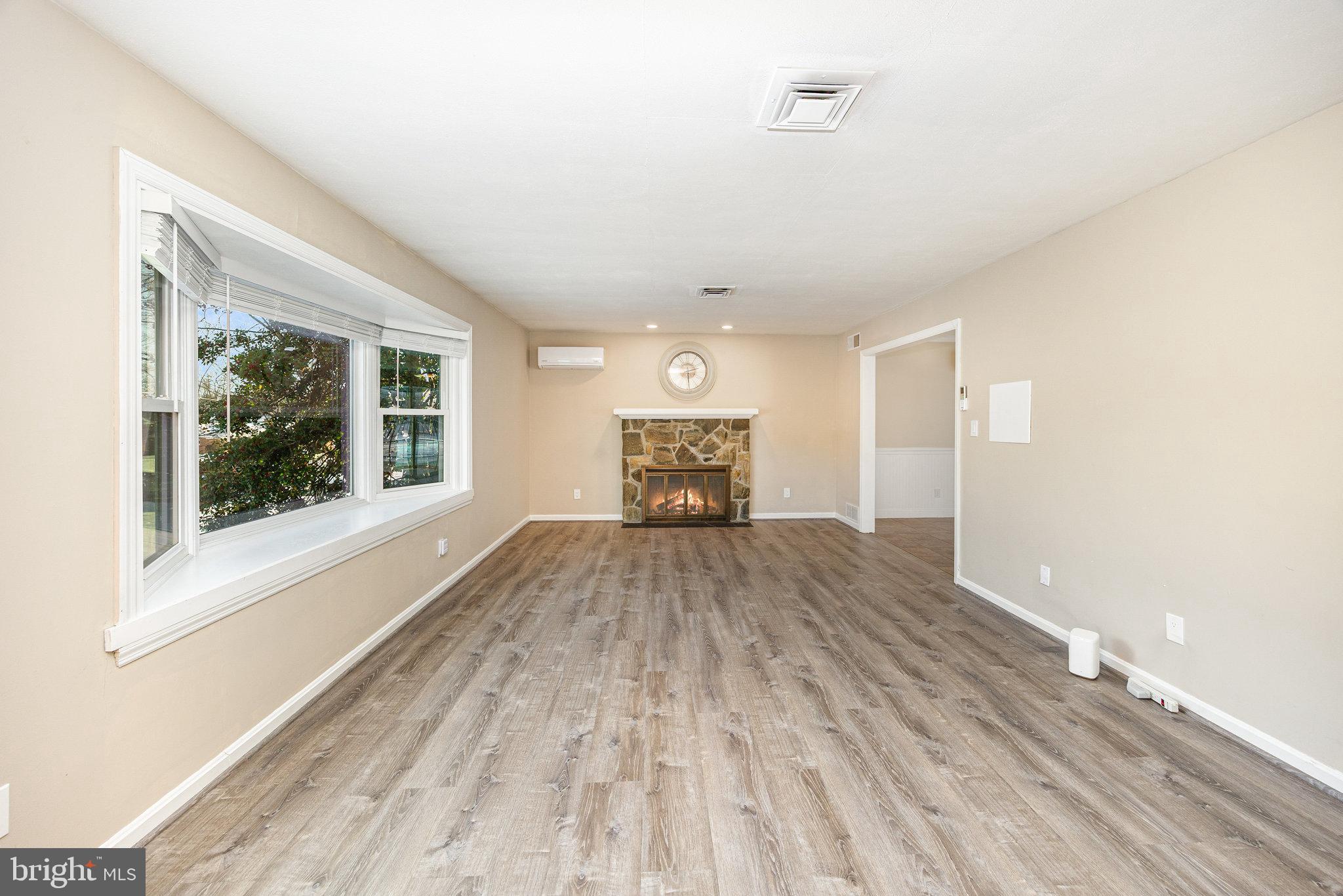 1808 Westfield Road Harrisburg, PA 17112 - Photo 6 of 39 Living room with fireplace and mini split
