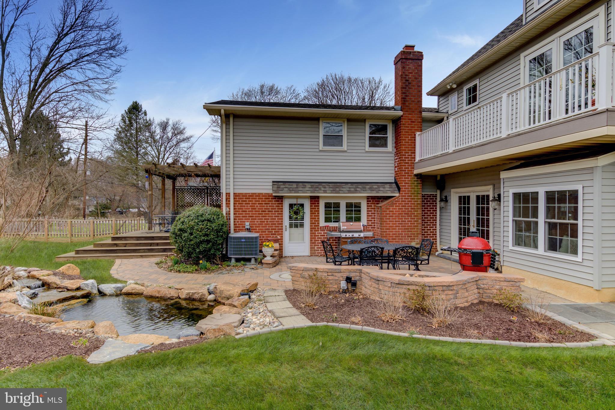 362 Old State Road Berwyn, PA 19312 - Photo 1 of 45 Back of house with patio and pond