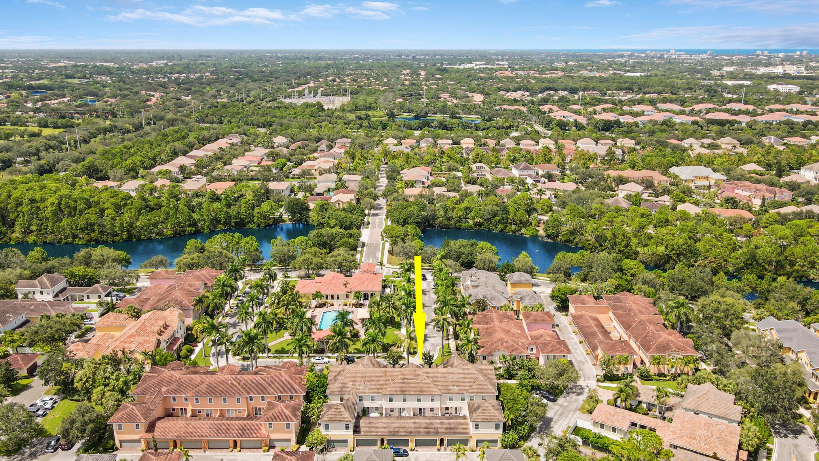 151 Mulligan Place Jupiter, FL 33458 - Photo 3 of 23 an aerial view of residential houses with outdoor space and trees