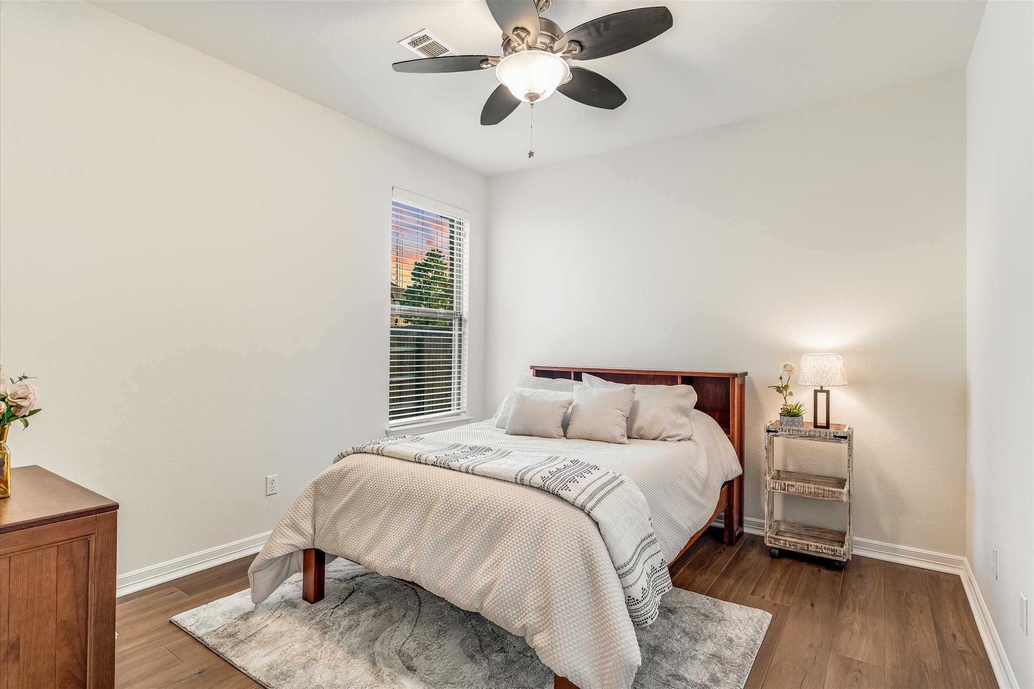 226 Galloway Lane Austin, TX 78737 - Photo 19 of 30 Bedroom featuring dark wood-type flooring and a ceiling fan