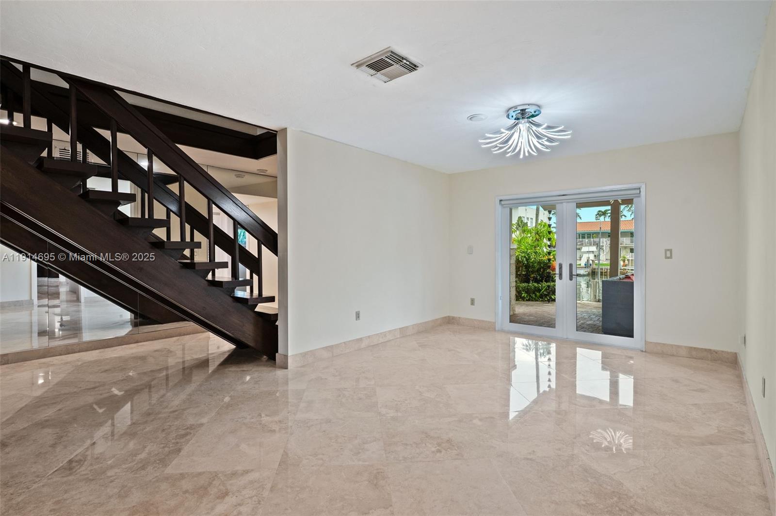 2015 Northeast 120th Road North Miami, FL 33181 - Photo 11 of 67 a view of an entryway with a front door