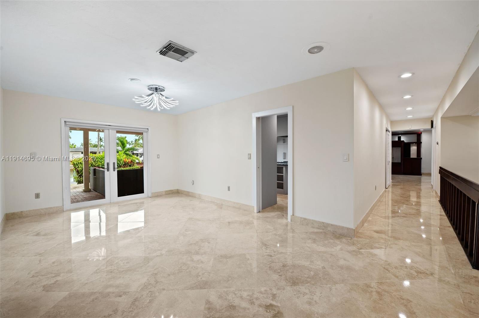 2015 Northeast 120th Road North Miami, FL 33181 - Photo 12 of 67 a view of an empty room with a window
