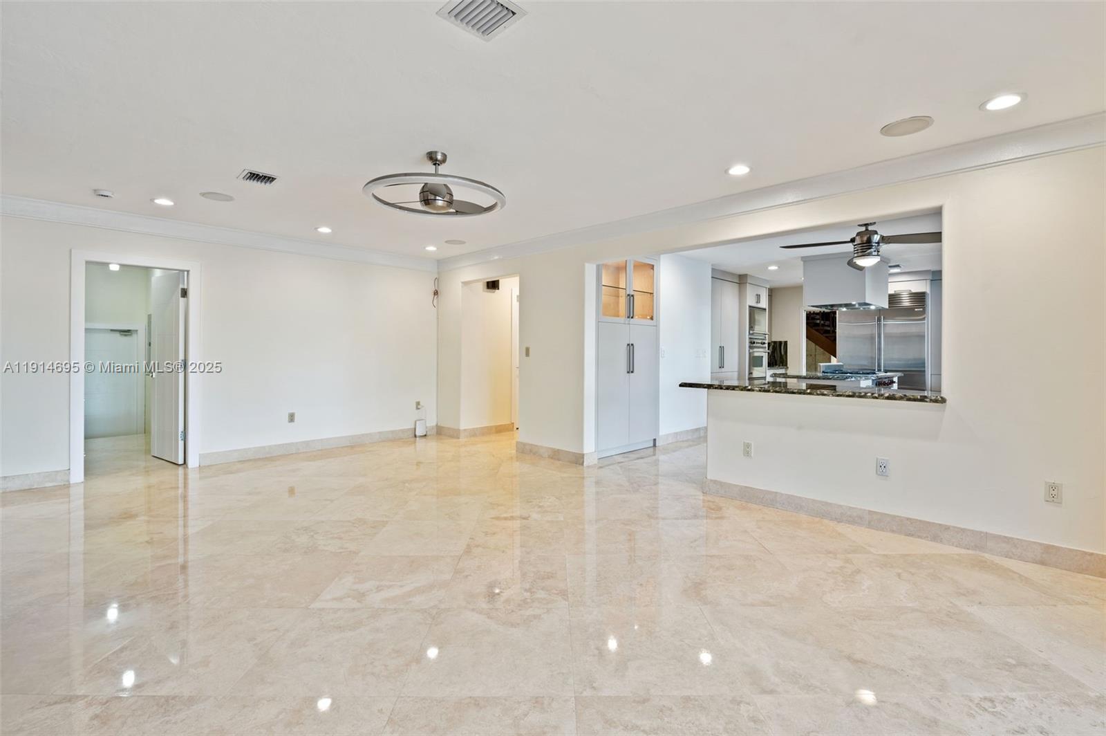 2015 Northeast 120th Road North Miami, FL 33181 - Photo 28 of 67 a view of a kitchen with a sink and a refrigerator