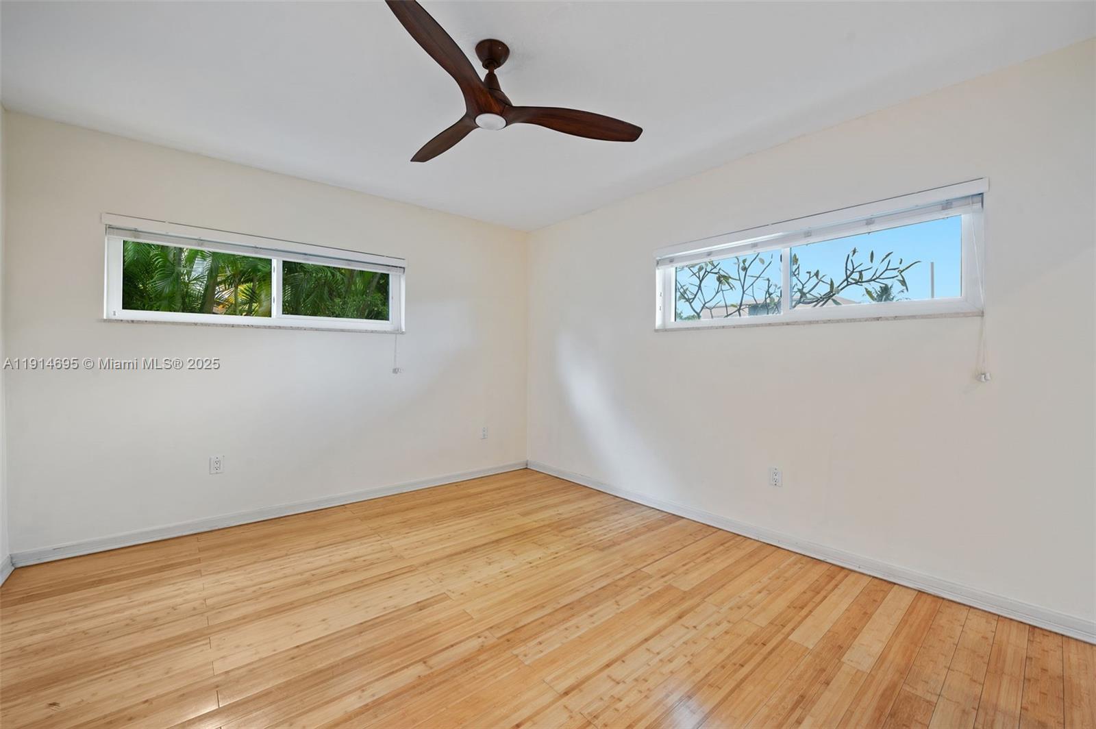2015 Northeast 120th Road North Miami, FL 33181 - Photo 38 of 67 a view of a room with wooden floor and window