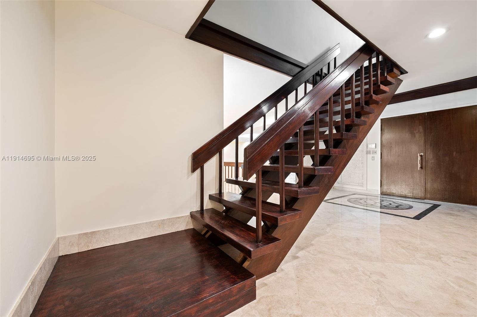 2015 Northeast 120th Road North Miami, FL 33181 - Photo 40 of 67 a view of entryway with wooden floor