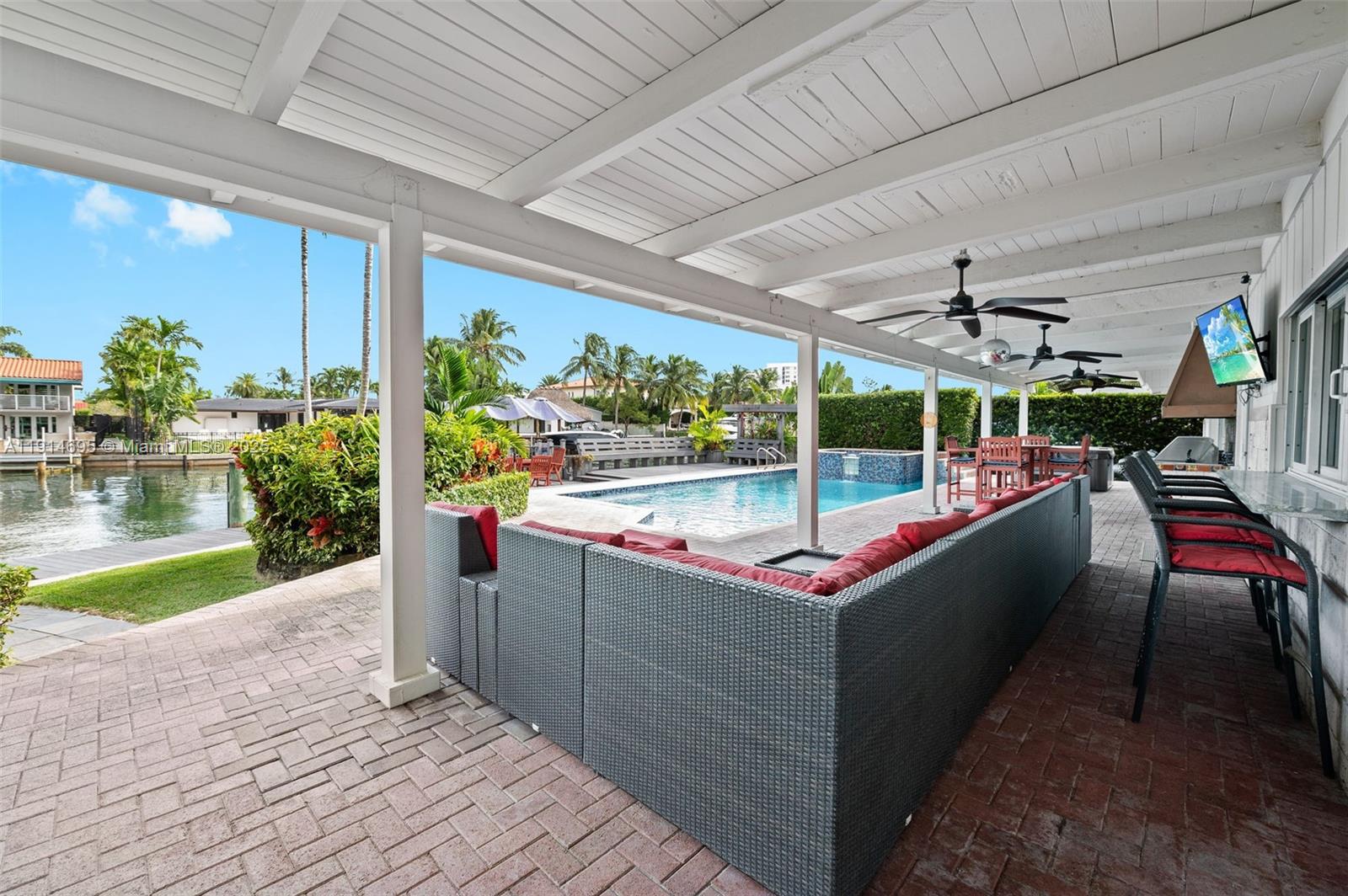 2015 Northeast 120th Road North Miami, FL 33181 - Photo 50 of 67 SPRAWLING ENTERTAINMENT PATIO
