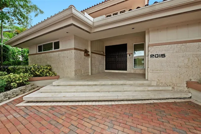 a view of an entryway with a front door