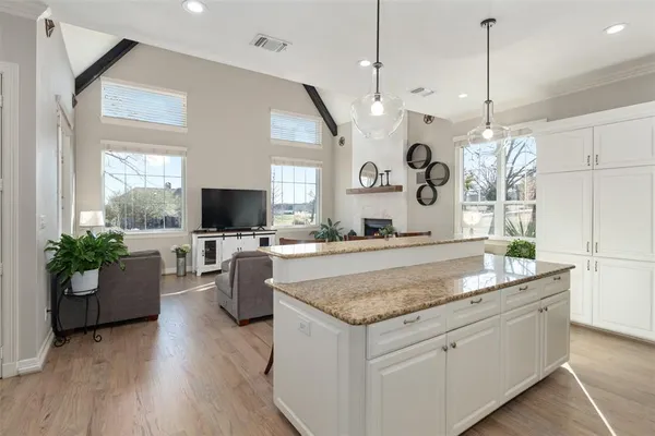 a view of living room and kitchen