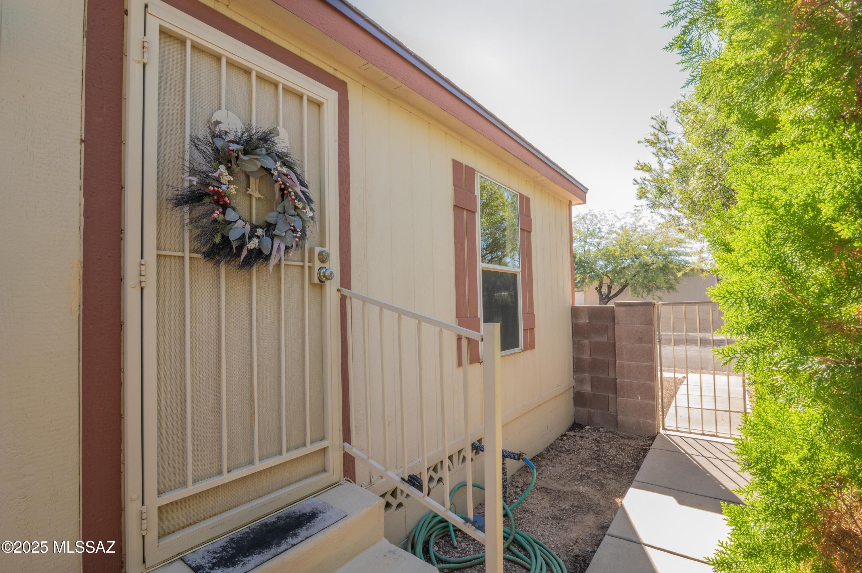 6205 East Rough Rock Drive Tucson, AZ 85756 - Photo 22 of 30 a view of a house with a backyard