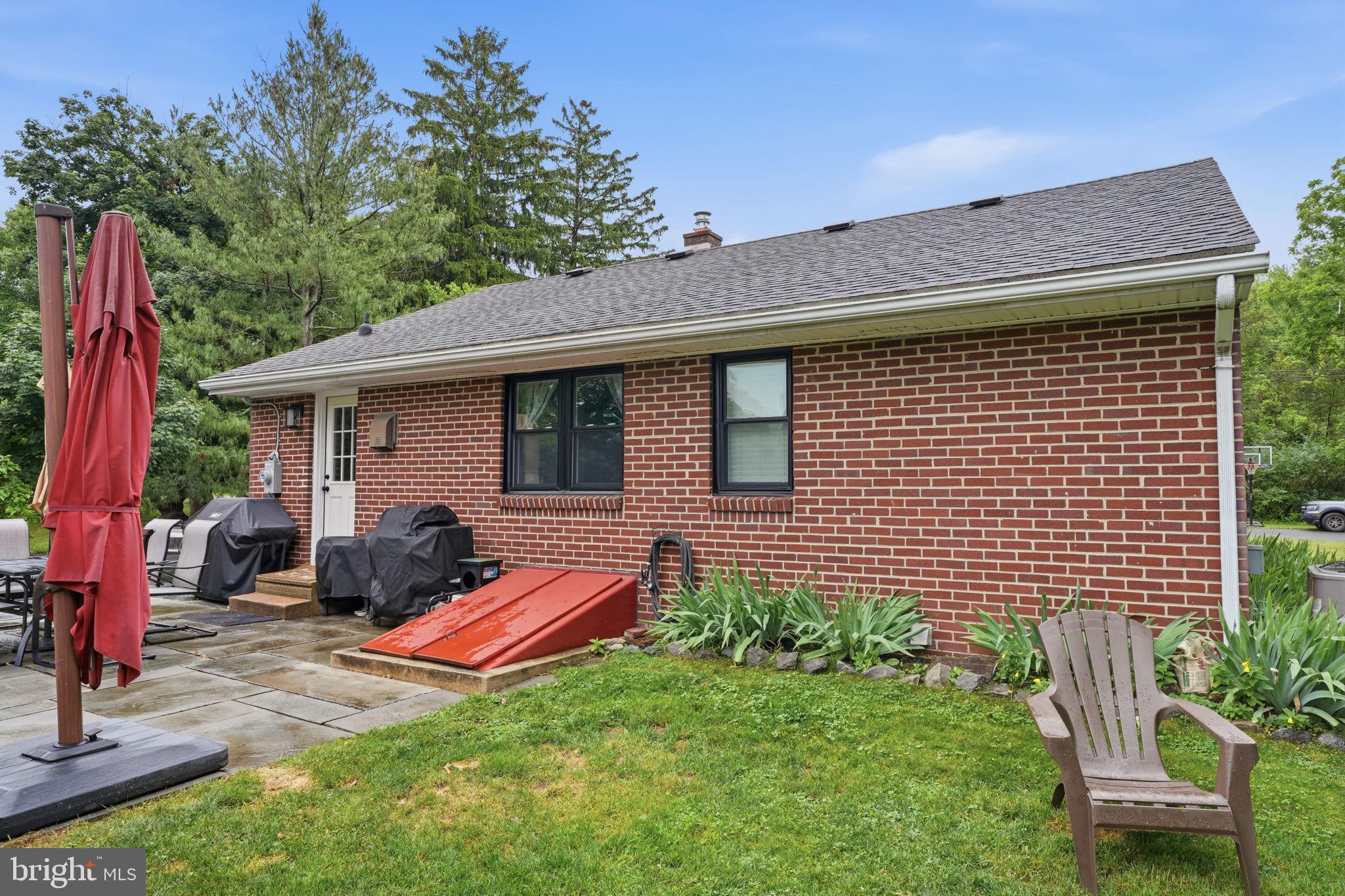 20 Poplar Road Ringoes, NJ 08551 - Photo 28 of 44 Charming brick home with lush greenery.