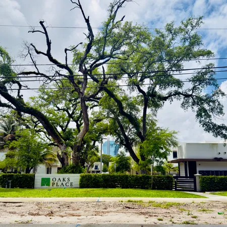 a view of a yard in front of a house