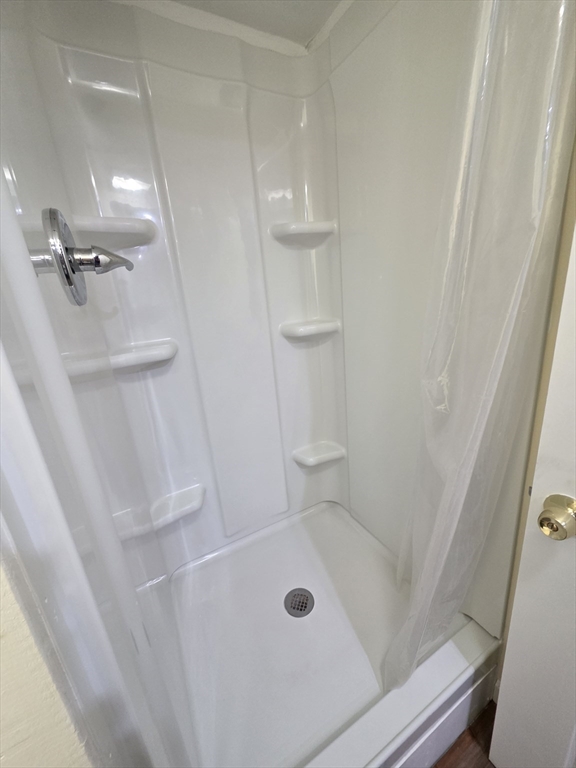 13 Pondview Way Carver, MA 02330 - Photo 13 of 22 a bathroom with a tub