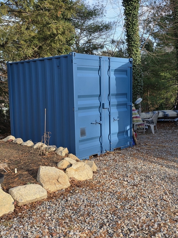 13 Pondview Way Carver, MA 02330 - Photo 15 of 22 a view of backyard with wooden fence