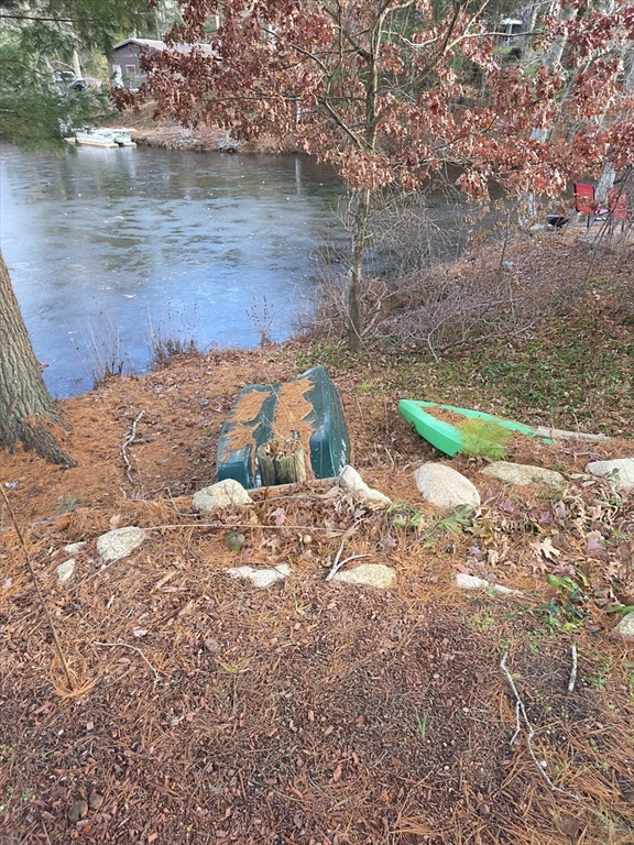 13 Pondview Way Carver, MA 02330 - Photo 6 of 22 a view of a yard with water view