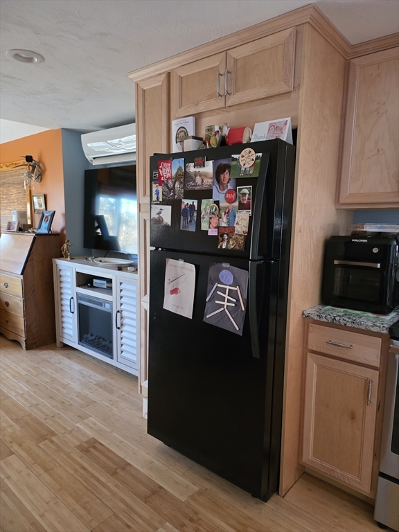 13 Pondview Way Carver, MA 02330 - Photo 7 of 22 a kitchen with stainless steel appliances granite countertop a refrigerator and a stove