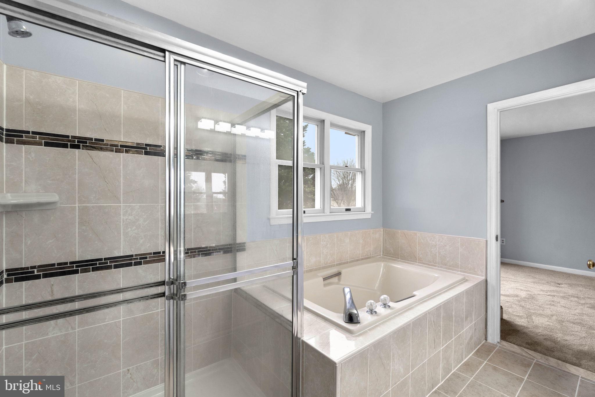 4505 Rusty Gate Ellicott City, MD 21043 - Photo 31 of 50 Seperate Shower - New Tile and Fixtures