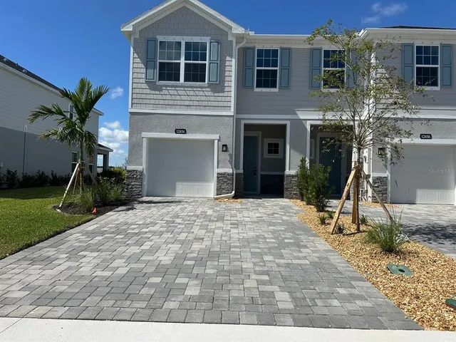 a house view with a backyard space
