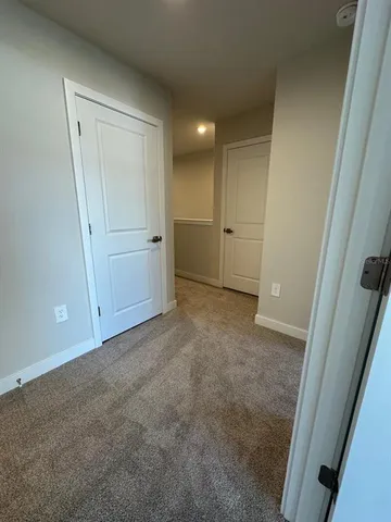 a room with sink and mirror