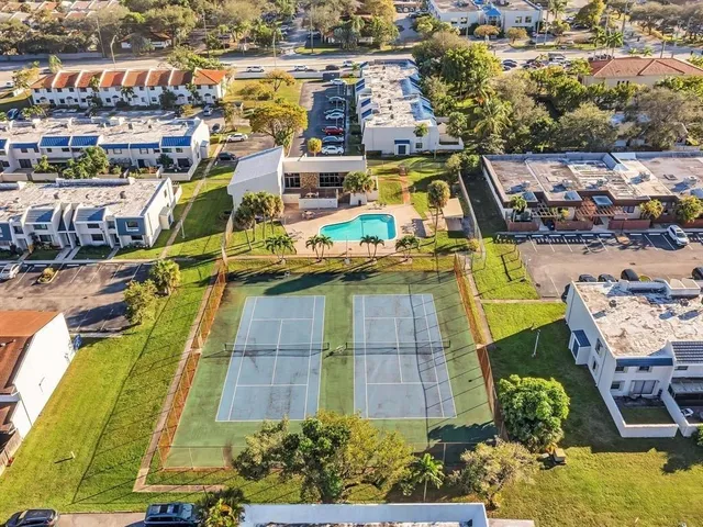 an aerial view of a house with a ocean view