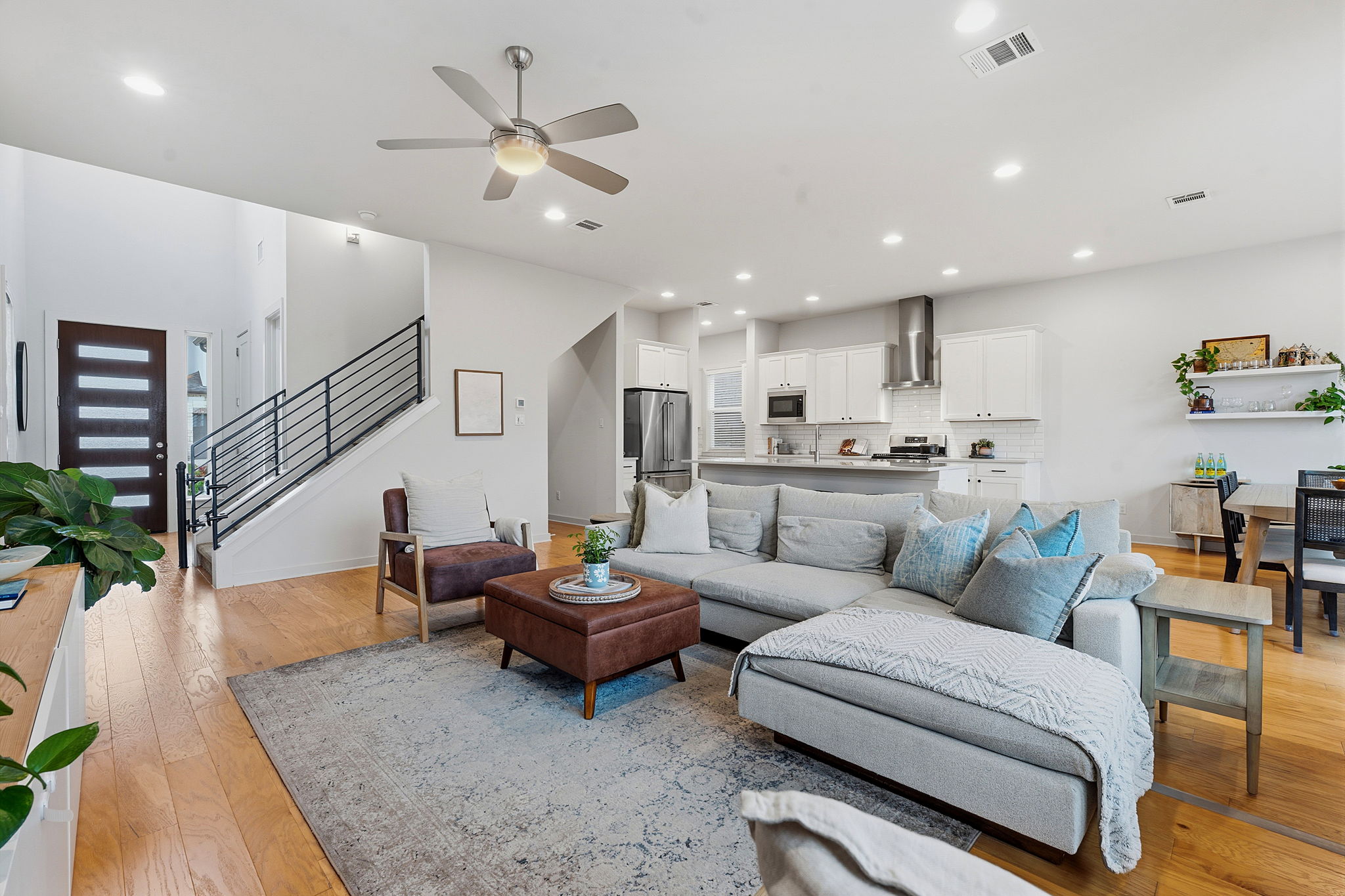 900 Old Mill Road, Unit 46 Cedar Park, TX 78613 - Photo 1 of 30 Living room featuring light wood finished floors, ceiling fan, and recessed lighting