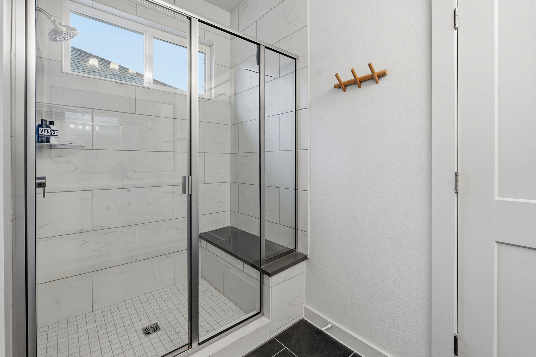 900 Old Mill Road, Unit 46 Cedar Park, TX 78613 - Photo 19 of 30 Bathroom featuring a shower stall and dark tile patterned flooring