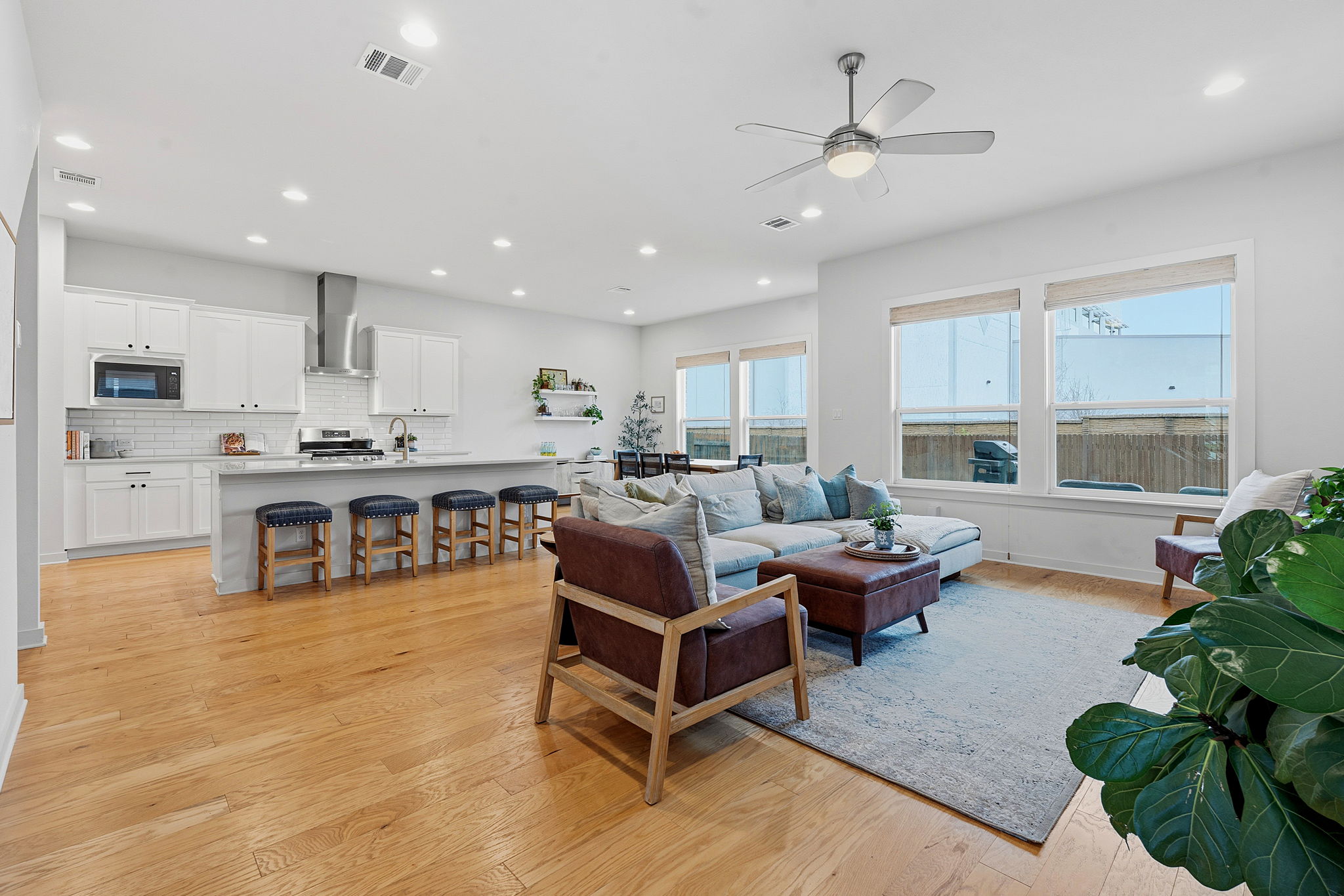 900 Old Mill Road, Unit 46 Cedar Park, TX 78613 - Photo 6 of 30 Living room with a ceiling fan, light wood-style flooring, and recessed lighting