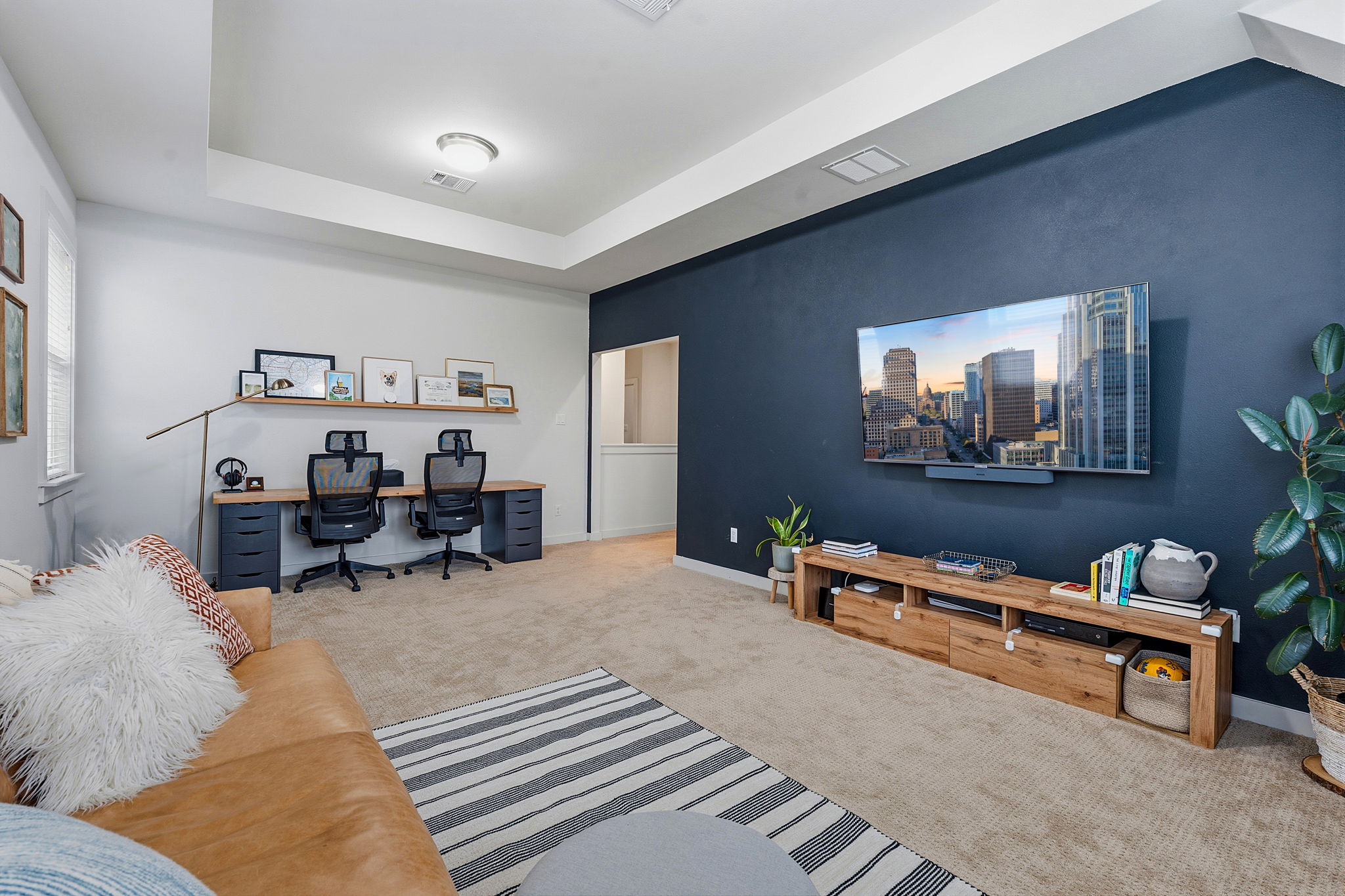 900 Old Mill Road, Unit 46 Cedar Park, TX 78613 - Photo 7 of 30 Home office featuring carpet floors and a raised ceiling