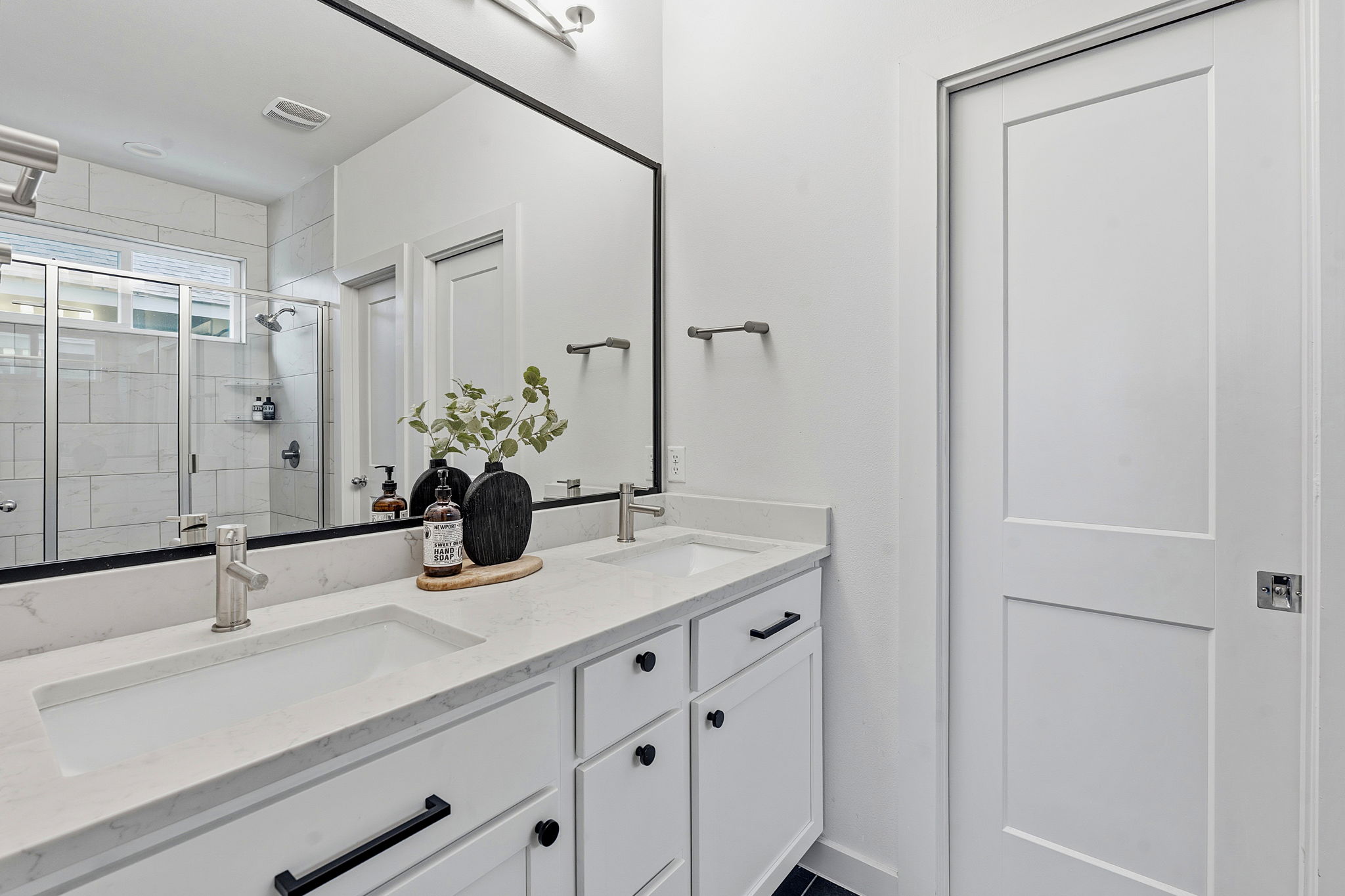 900 Old Mill Road, Unit 46 Cedar Park, TX 78613 - Photo 8 of 30 Bathroom featuring double vanity and a shower stall