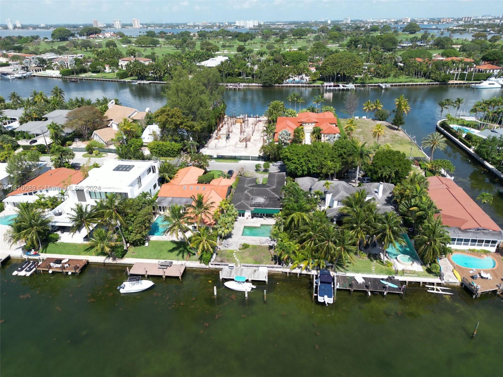 1429 Biscaya Drive Surfside, FL 33154 - Photo 5 of 6 an aerial view of a houses with a lake view