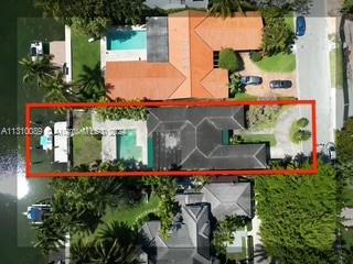 1429 Biscaya Drive Surfside, FL 33154 - Photo 6 of 6 an aerial view of a house with a yard