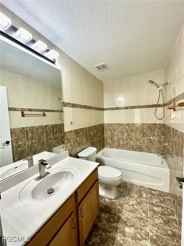a view of a storage & utility room with racks on the wall