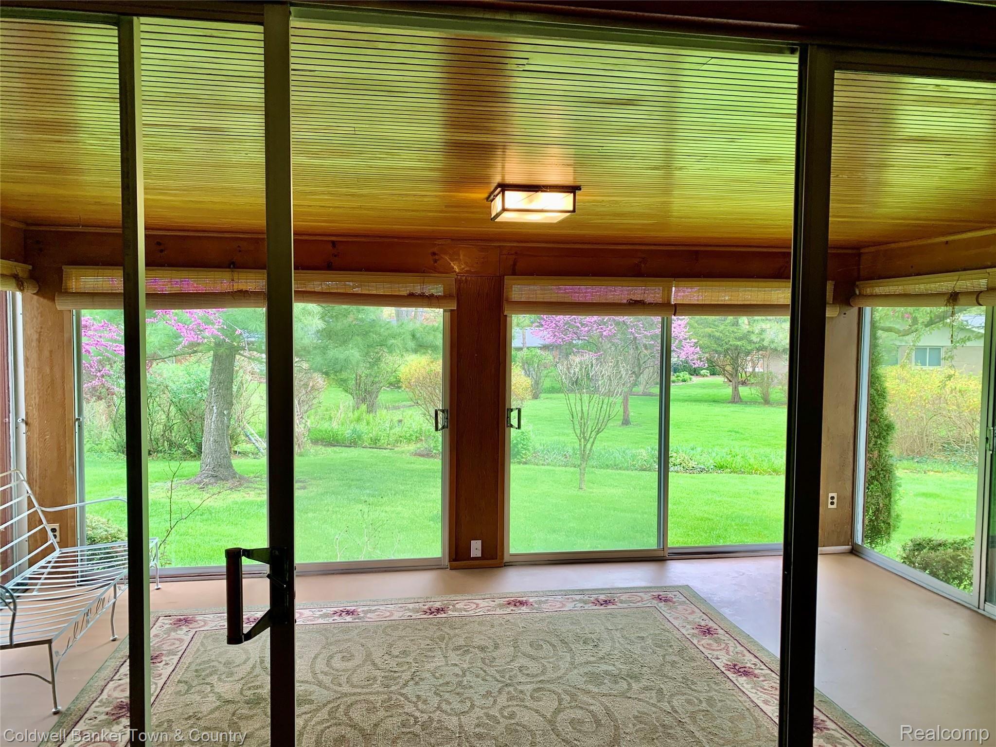 34330 Freedom Road Farmington, MI 48335 - Photo 17 of 45 Three season room with glass doors.