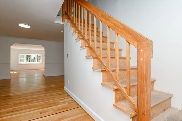 a view of entryway with wooden floor