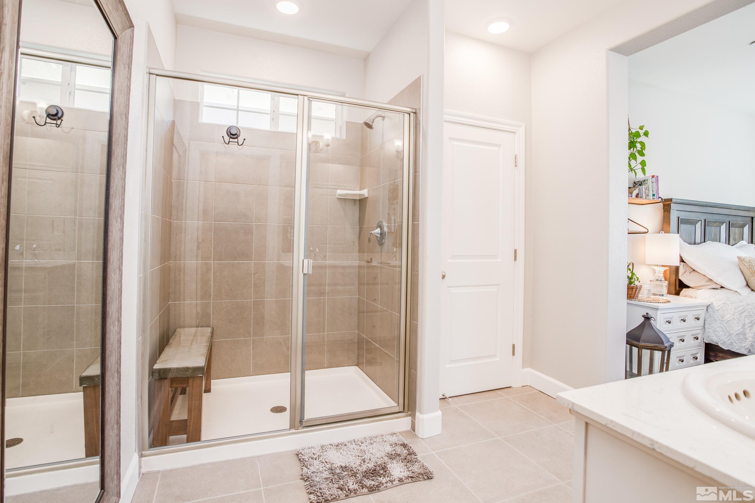 1864 Sea Horse Road, Unit A Reno, NV 89521 - Photo 10 of 17 a bathroom with a shower and a sink