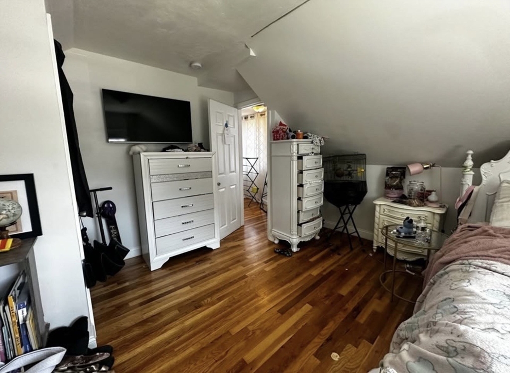 69 Beacon Street, Unit 3 Chelsea, MA 02150 - Photo 5 of 9 a view of a livingroom with space and a flat screen tv